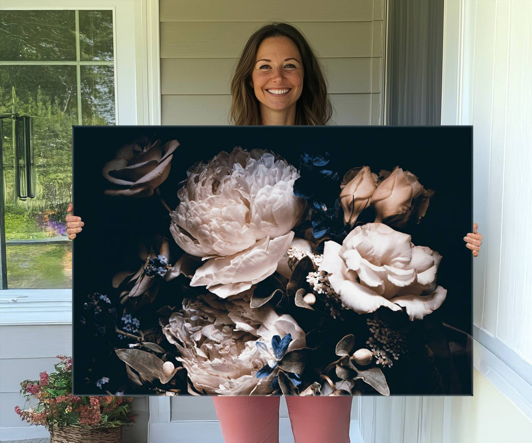 A large canvas art print of pink peonies flowers adds a vibrant touch to the space.