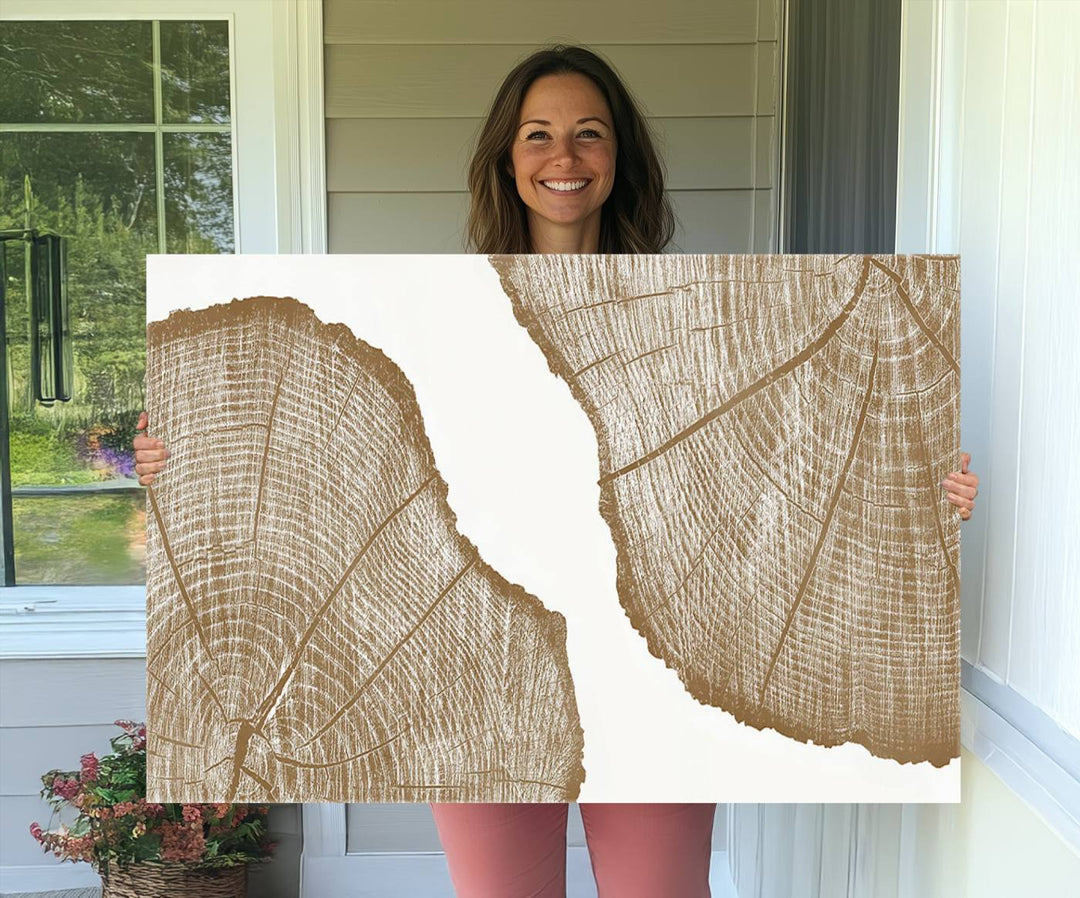 The rustic wall art features two large tree rings, beautifully framed and displayed to create a nature-inspired décor.