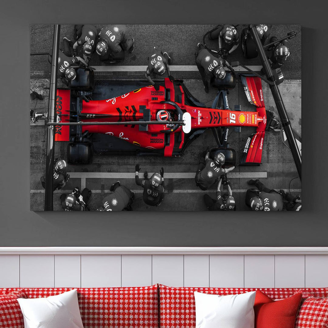 The Ferrari Pit Stop Canvas Wall Art features bold motorsport imagery that captures the precision and speed of Formula 1.