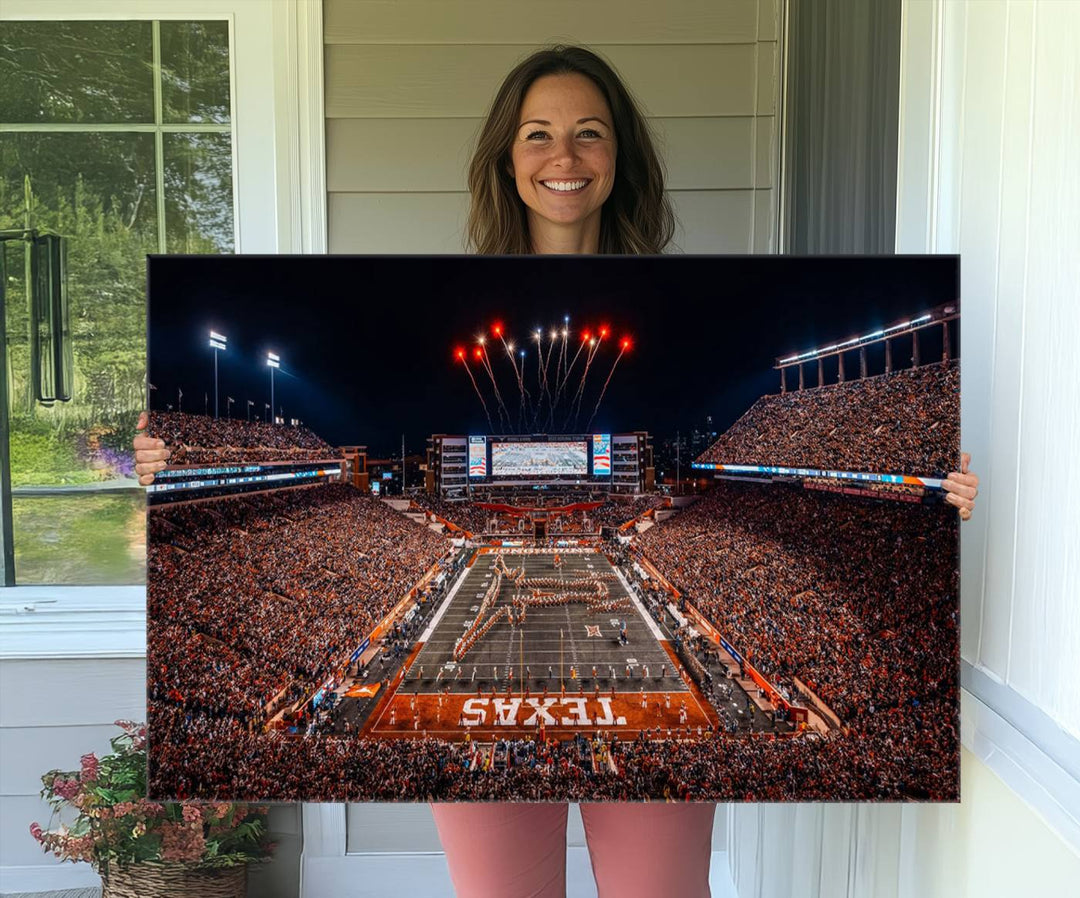 A Texas Memorial Stadium canvas print with fireworks embellishes the modern living room.