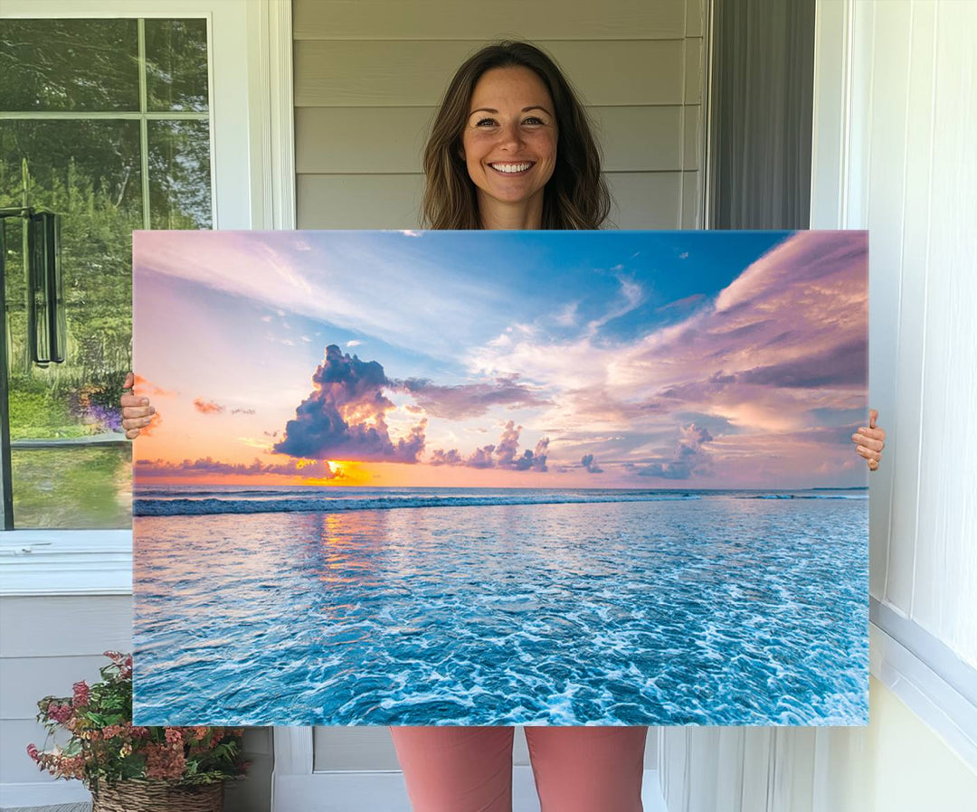 An Ocean Sunset Canvas Wall Art depicting a vibrant sky and rolling waves.