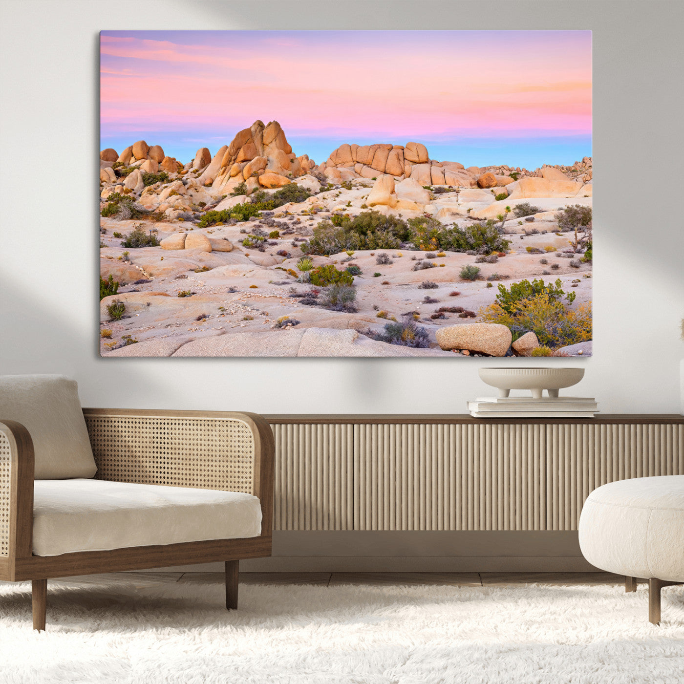 A breathtaking desert landscape featuring rugged rock formations under a vibrant pastel sunset sky, capturing the warmth and serenity of a Southwestern wilderness.