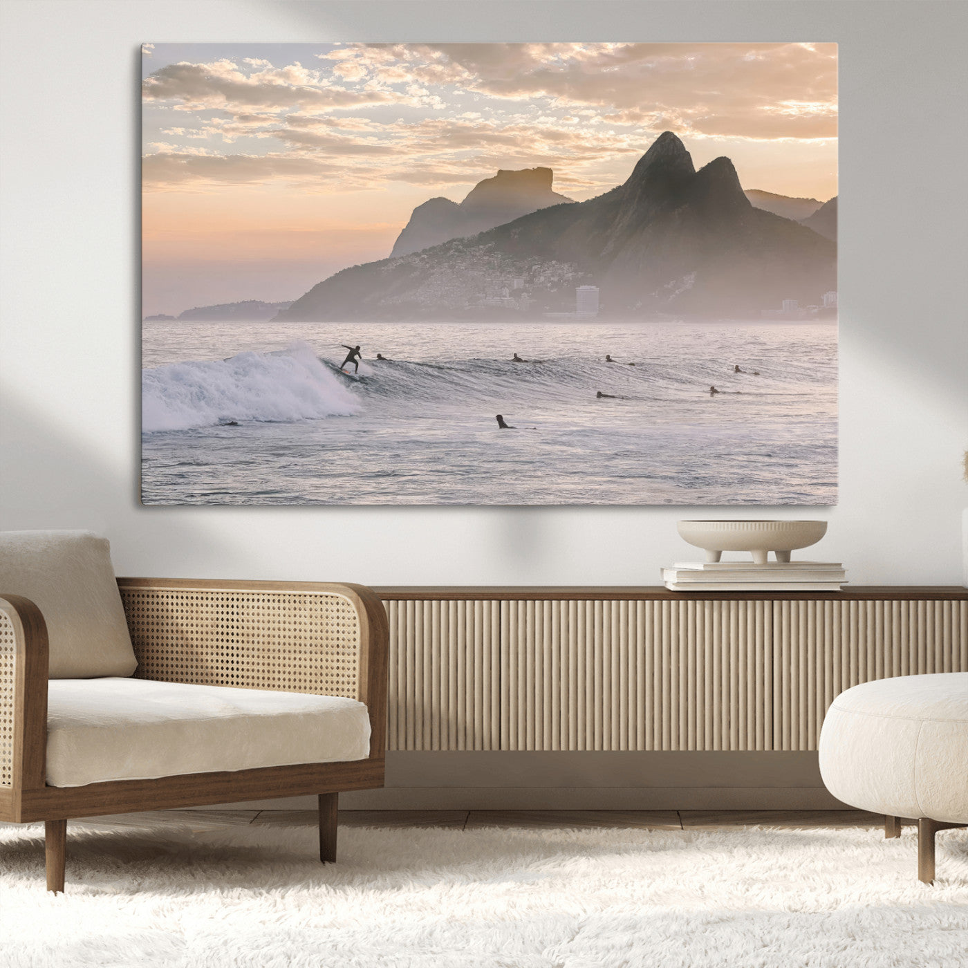 A surfer rides a golden hour wave near misty coastal mountains, surrounded by fellow surfers, capturing the spirit of a coastal adventure.