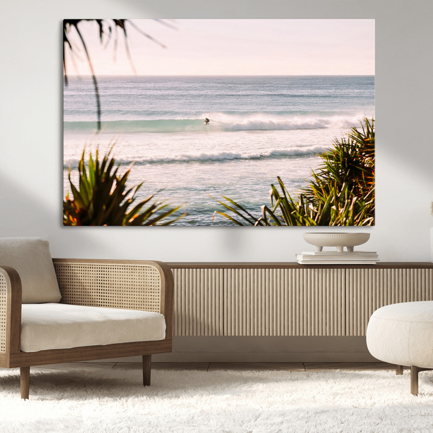 Canvas of a lone surfer riding a pastel wave at sunrise, perfect for tropical or coastal-themed spaces with a relaxed, airy vibe.