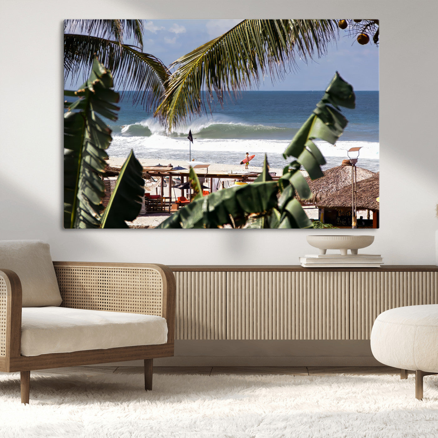Canvas wall art of a tropical surf scene framed by palm trees, with a surfer on the shore and waves rolling in, ideal for beach-themed decor.