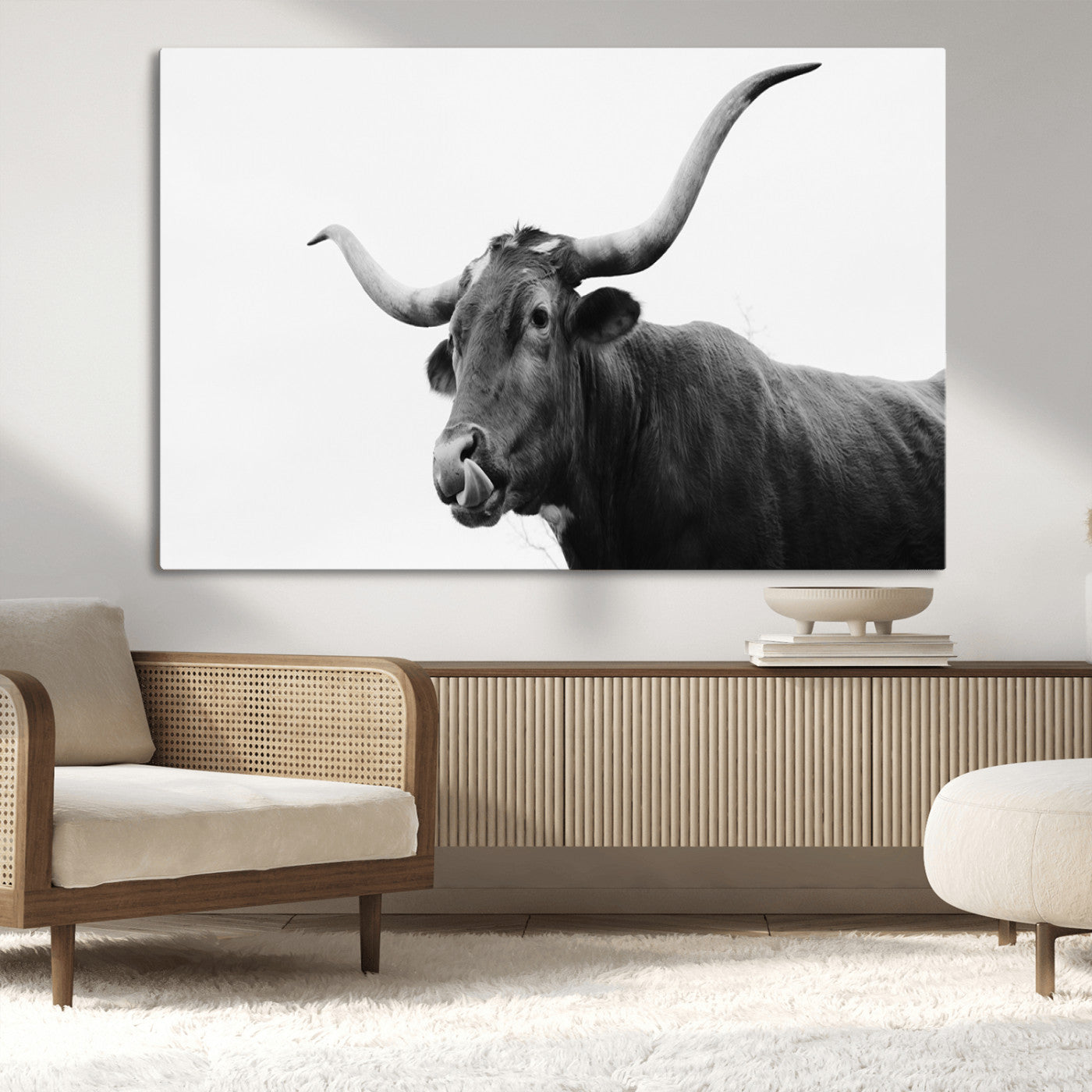 Black and white photo of a Texas Longhorn cow with curved horns, ideal for rustic, western or minimalist style home decor.