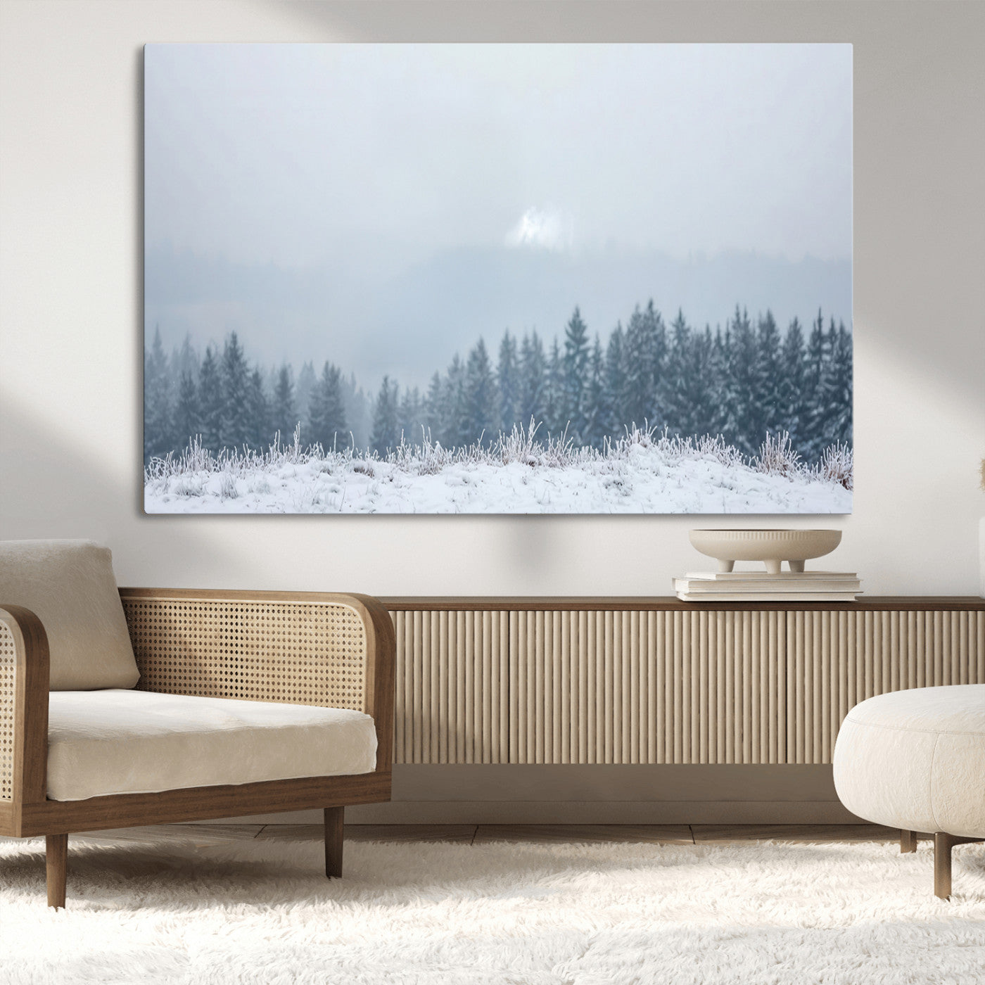 Snow-covered forest under misty sky, soft light breaking through clouds, ideal for minimalist or Nordic-inspired home decor.