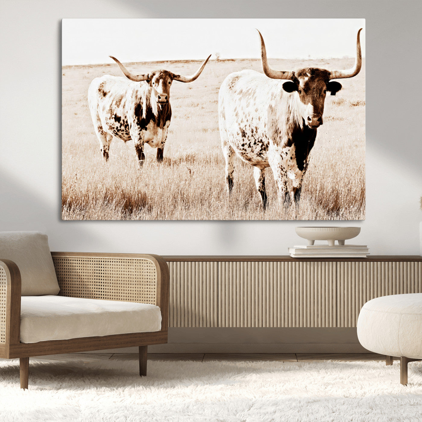 Two Texas longhorn cows standing in a sepia-toned pasture, evoking rustic charm perfect for farmhouse or western country interiors. (