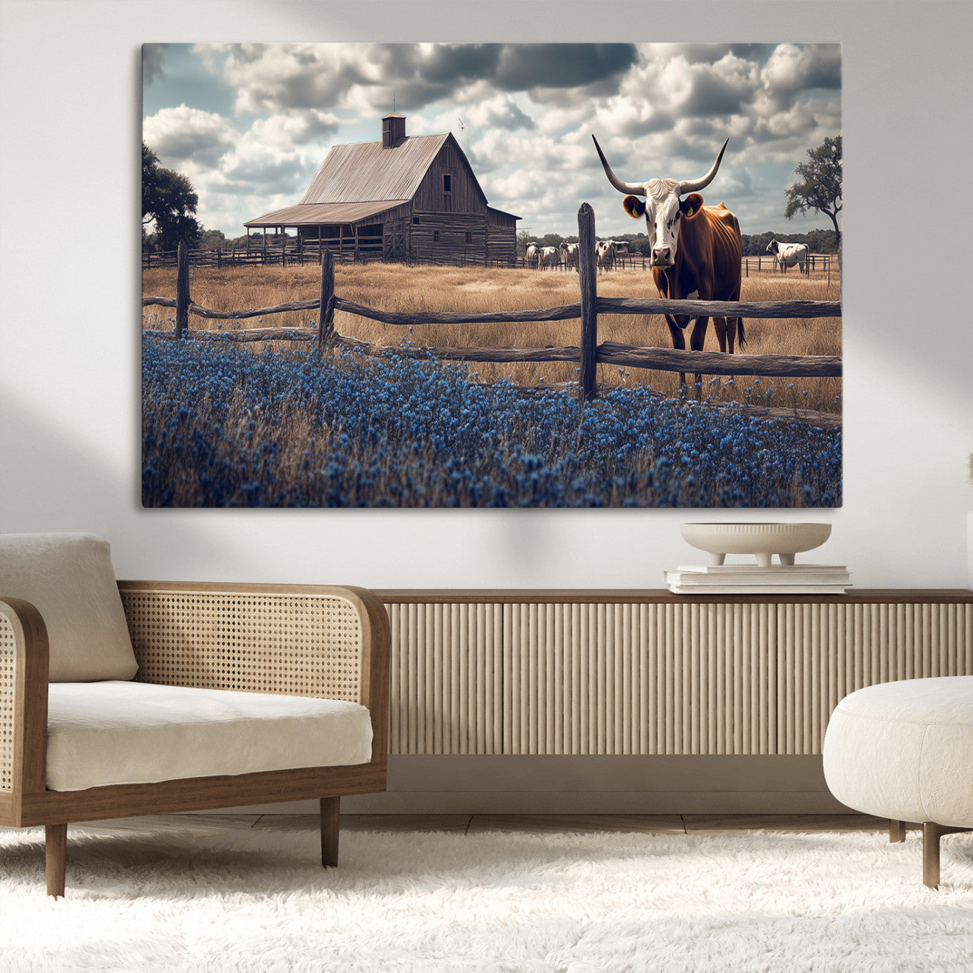 Framed canvas art of a Texas Longhorn cow near a rustic barn and bluebonnet field, ideal for country-style or farmhouse wall decor.