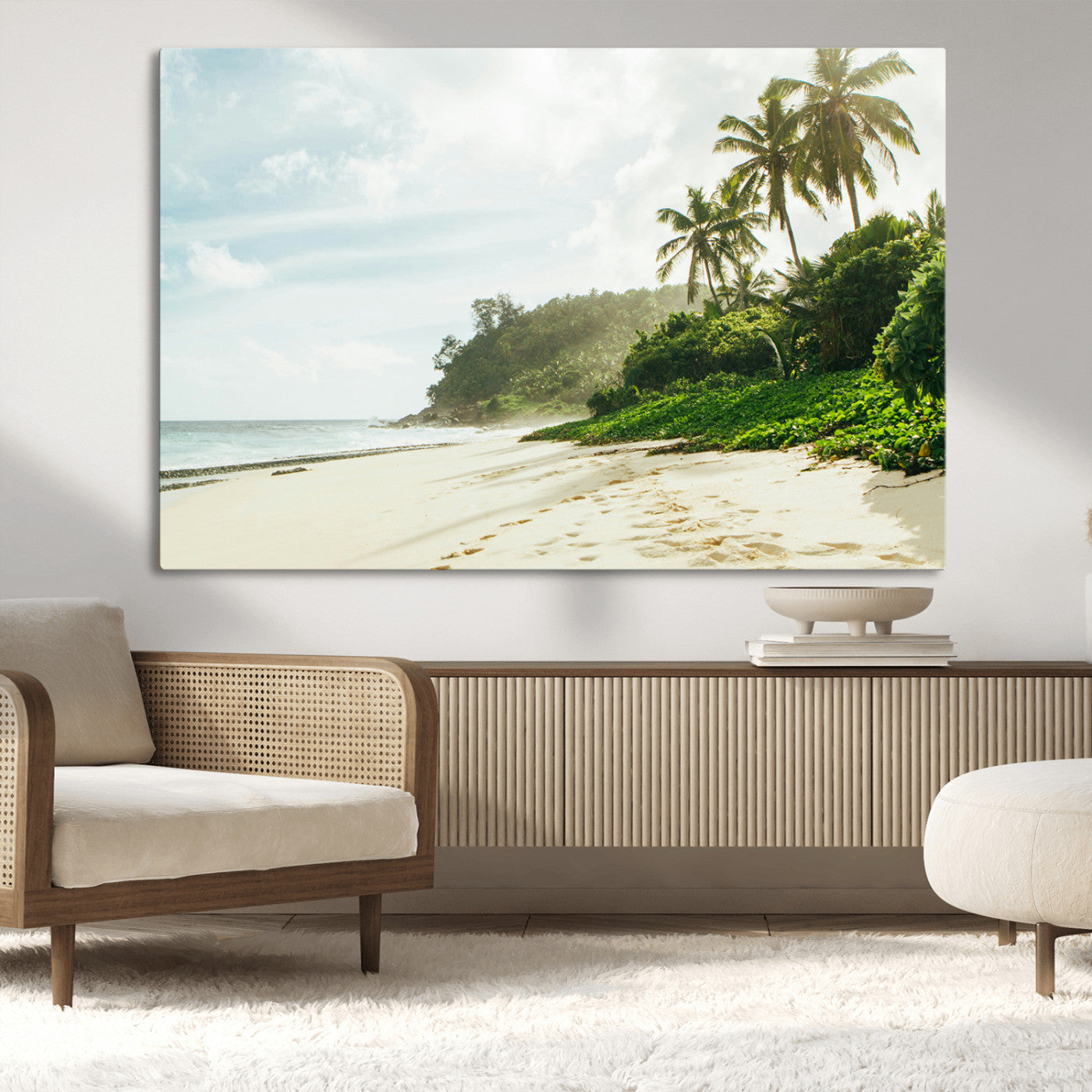 A tropical beach with palm trees, soft sand, and ocean waves under a bright sky, creating a peaceful and relaxing coastal view.