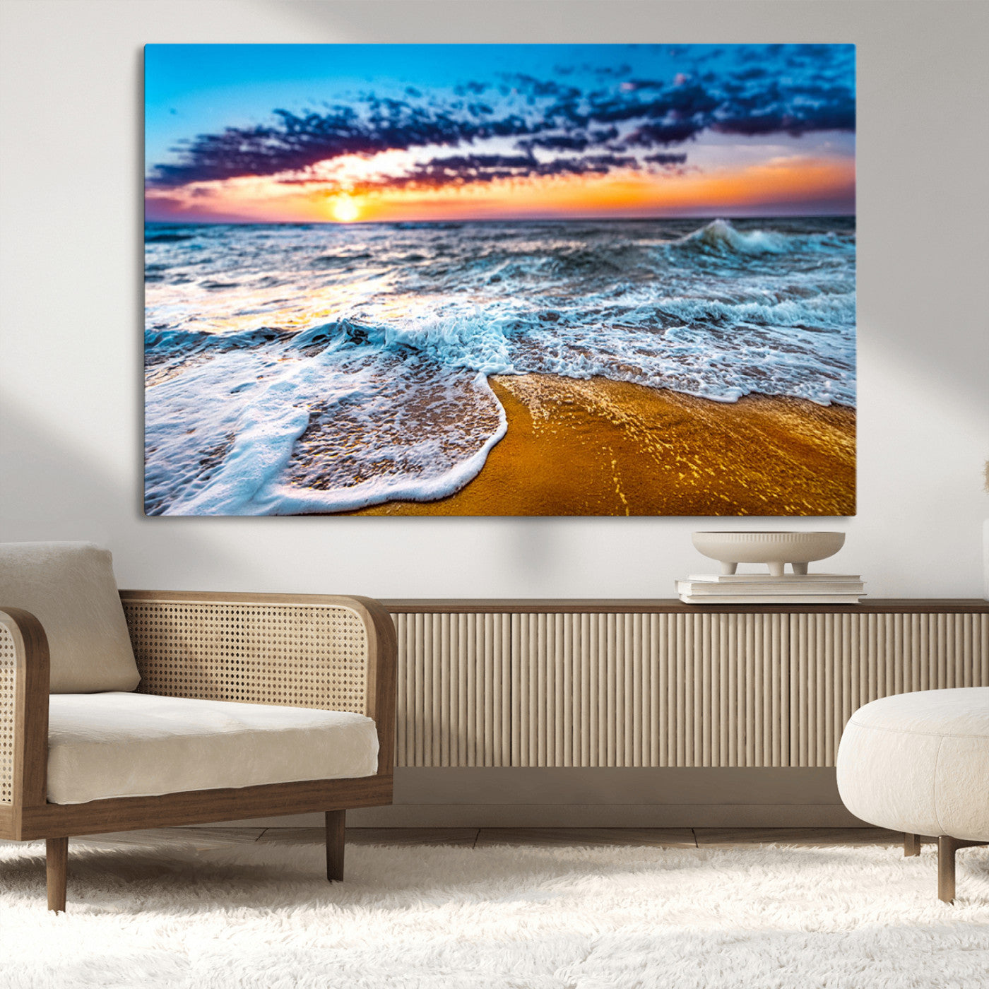 Beautiful ocean shoreline at sunset with foamy waves washing onto golden sand under a colorful sky – Wall Art Canvas Print.