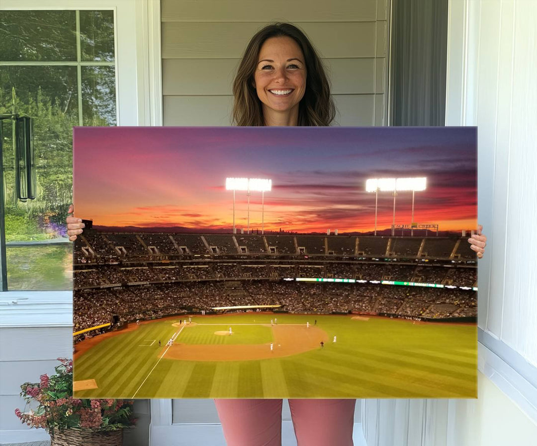 The Oakland Coliseum print is a museum-quality canvas depicting a full crowd and a sunset.