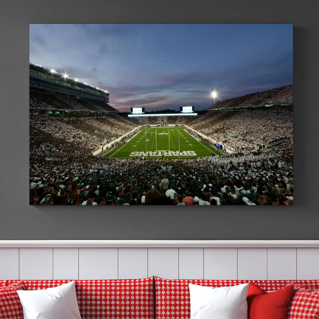 Wall art featuring a stadium at dusk with full stands—ideal for the Michigan State Spartans Football Team Canvas Print.