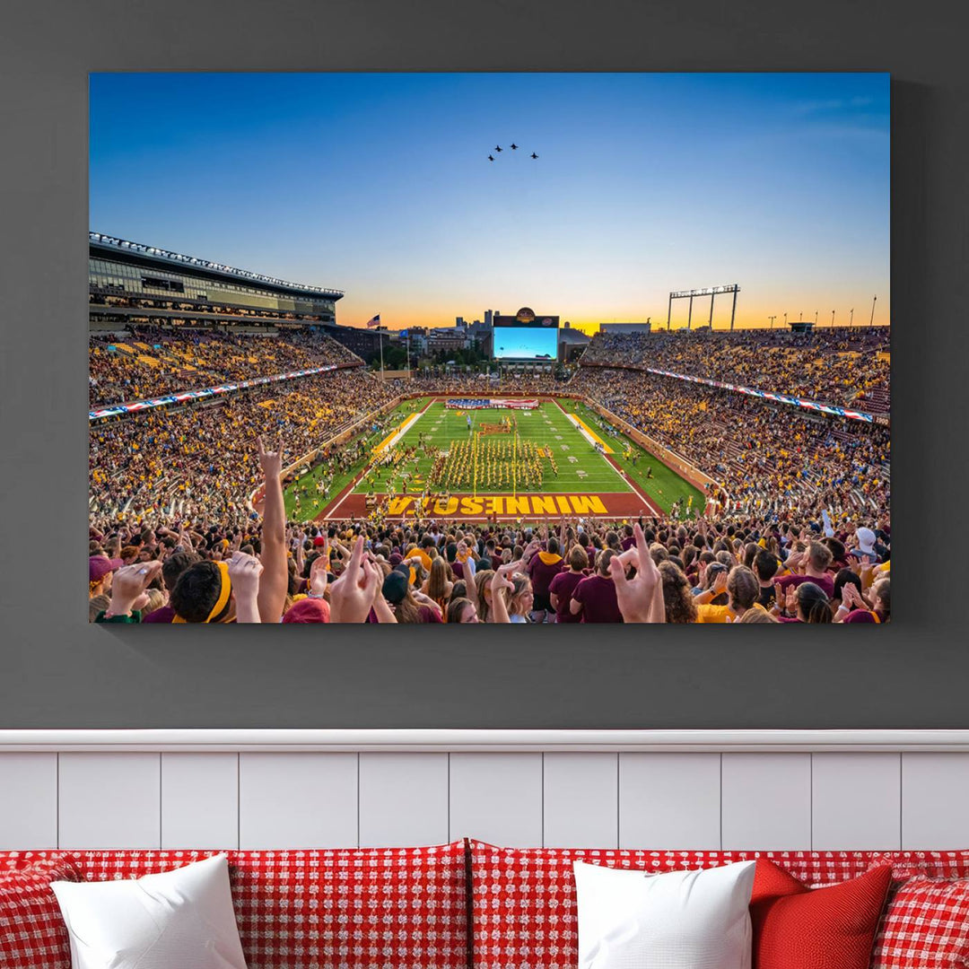 Canvas wall art featuring the University of Minnesota Football Team print, showcasing Huntington Bank Stadium at sunset with jets overhead.