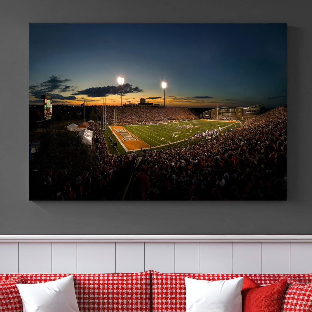 Ball State Cardinals Football Team Print - Muncie Scheumann Stadium Canvas featuring a sunset, floodlights, and lively crowd.