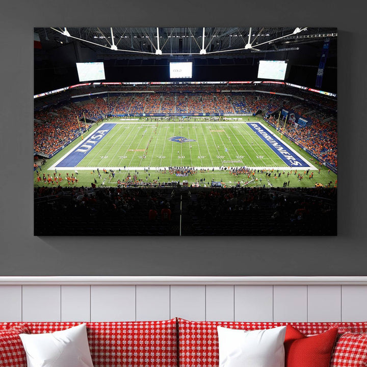 The UTSA Roadrunners game at Alamodome canvas print captures the scene from above, displaying fans and the UTSA lettering on the field.