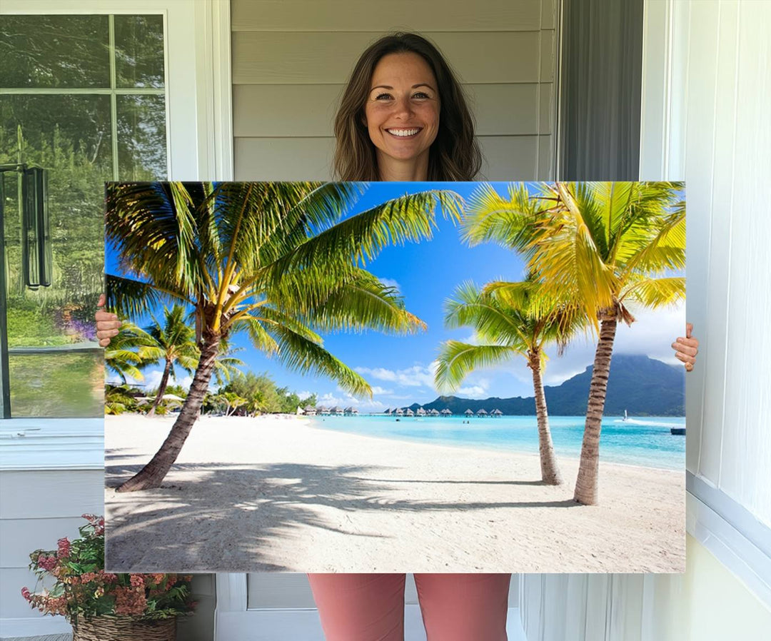 Blue Beach and Sea Wall Art Canvas Print: showcases a tropical scene with palm trees, white sand, and turquoise water.