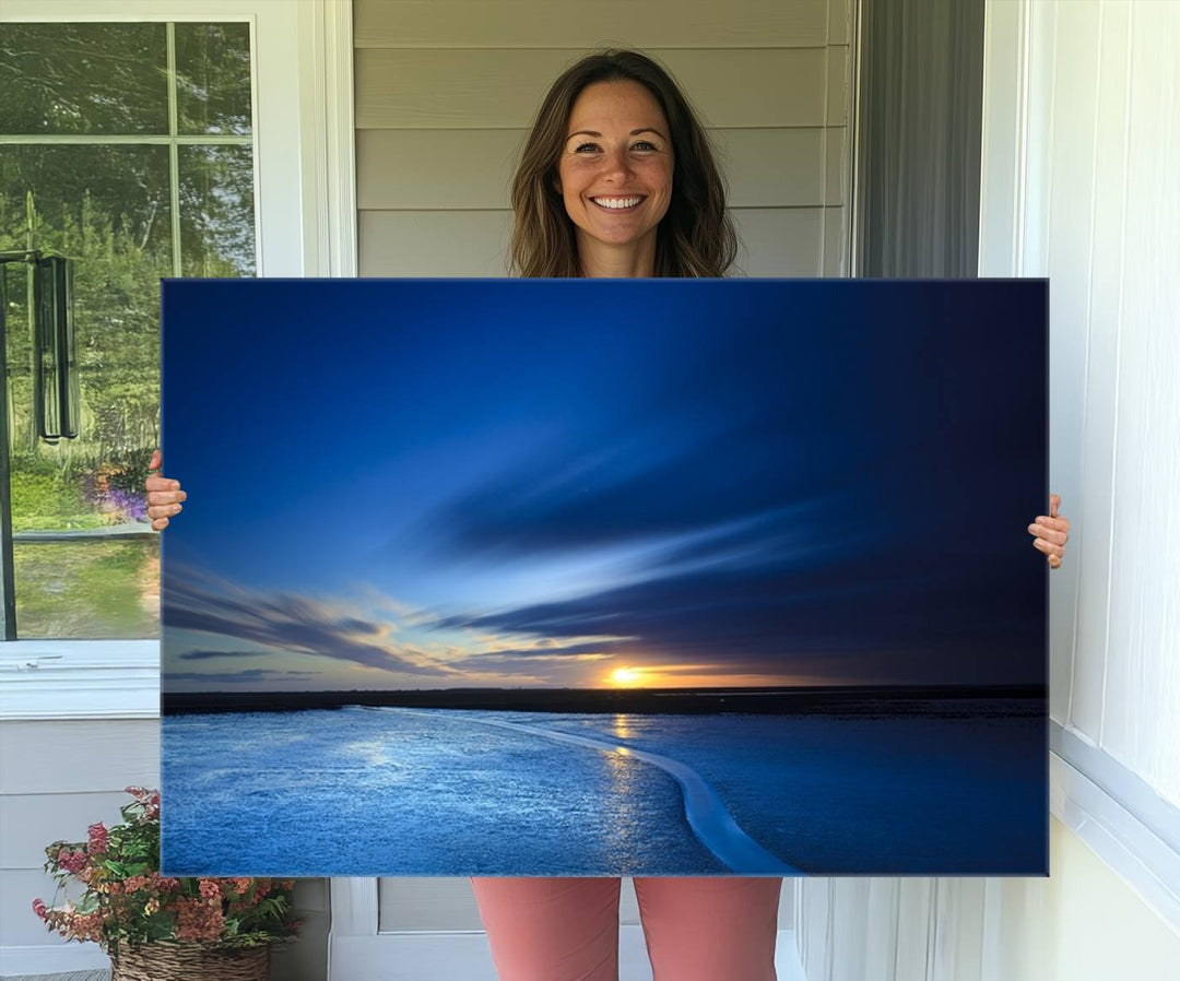 A blue sunset ocean canvas wall art print.