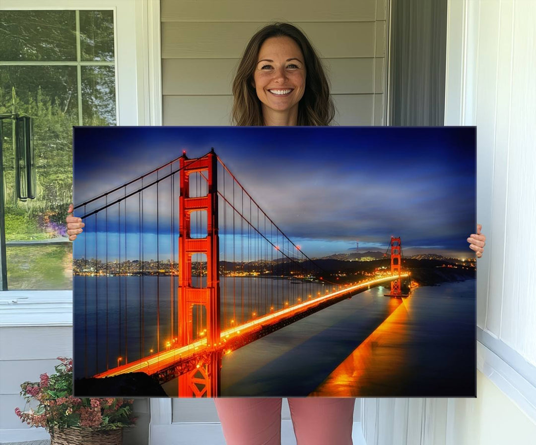 A large wall art San Francisco canvas print of the Golden Gate Bridge at twilight is displayed on a porch.