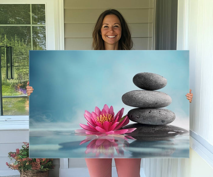 The dining room features a Zen Serenity Triptych wall art, showcasing a calming depiction of lotus flowers and balancing stones.