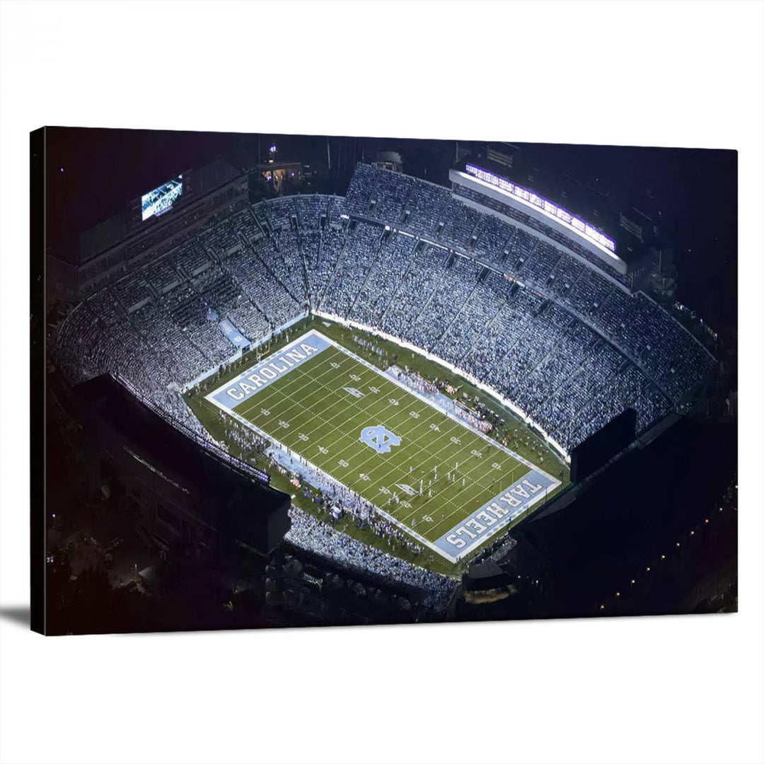 A University of North Carolina Tar Heels Football Team Print, showcasing Chapel Hill's Kenan Memorial Stadium, hangs in a modern dining room, adding a gallery-quality finish that enhances the entire space.