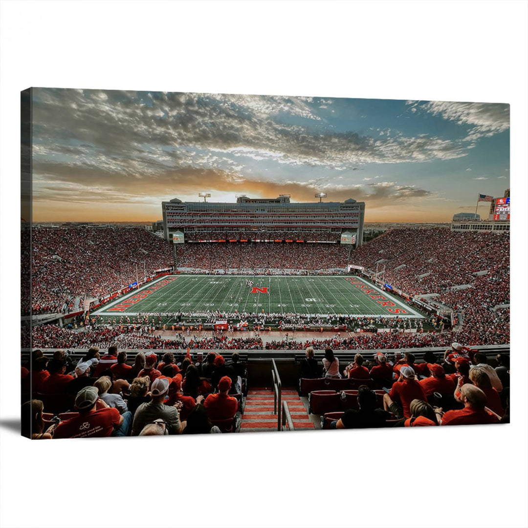 The living room features a stunning triptych of Lincoln Memorial Stadium wall art canvas print, celebrating the University of Nebraska Cornhuskers football team. This piece serves as captivating wall art, showcasing a gallery-quality finish.