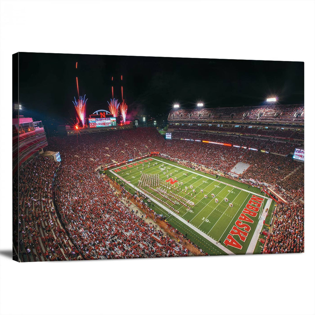 The University of Nebraska Cornhuskers Football Team Print, featuring Lincoln Memorial Stadium in a vibrant triptych canvas with fireworks above and a gallery-quality finish, is elegantly displayed.