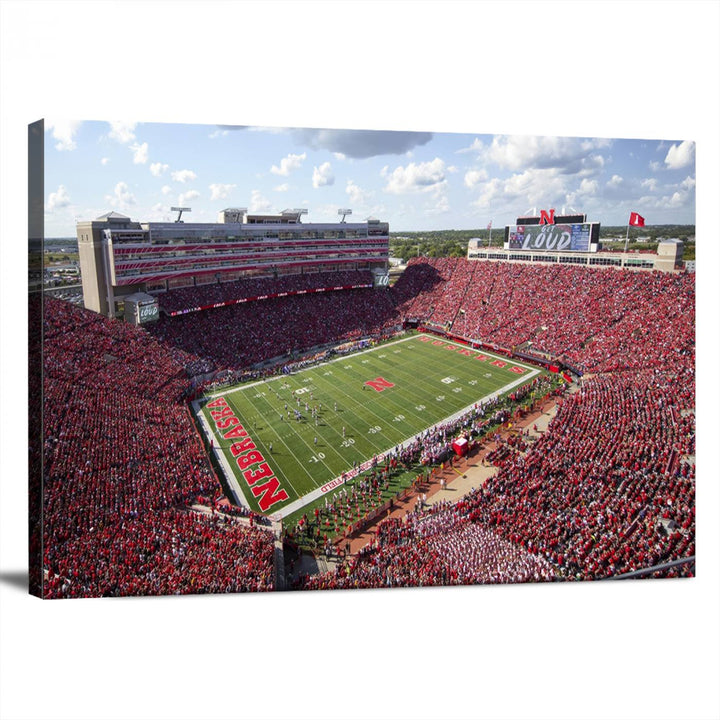 The University of Nebraska Cornhuskers Football Team Print showcases a vibrant triptych of Lincoln Memorial Stadium, depicting a packed football stadium filled with energetic fans. This handmade art piece is crafted in the USA and printed on premium canvas for a gallery-quality finish.