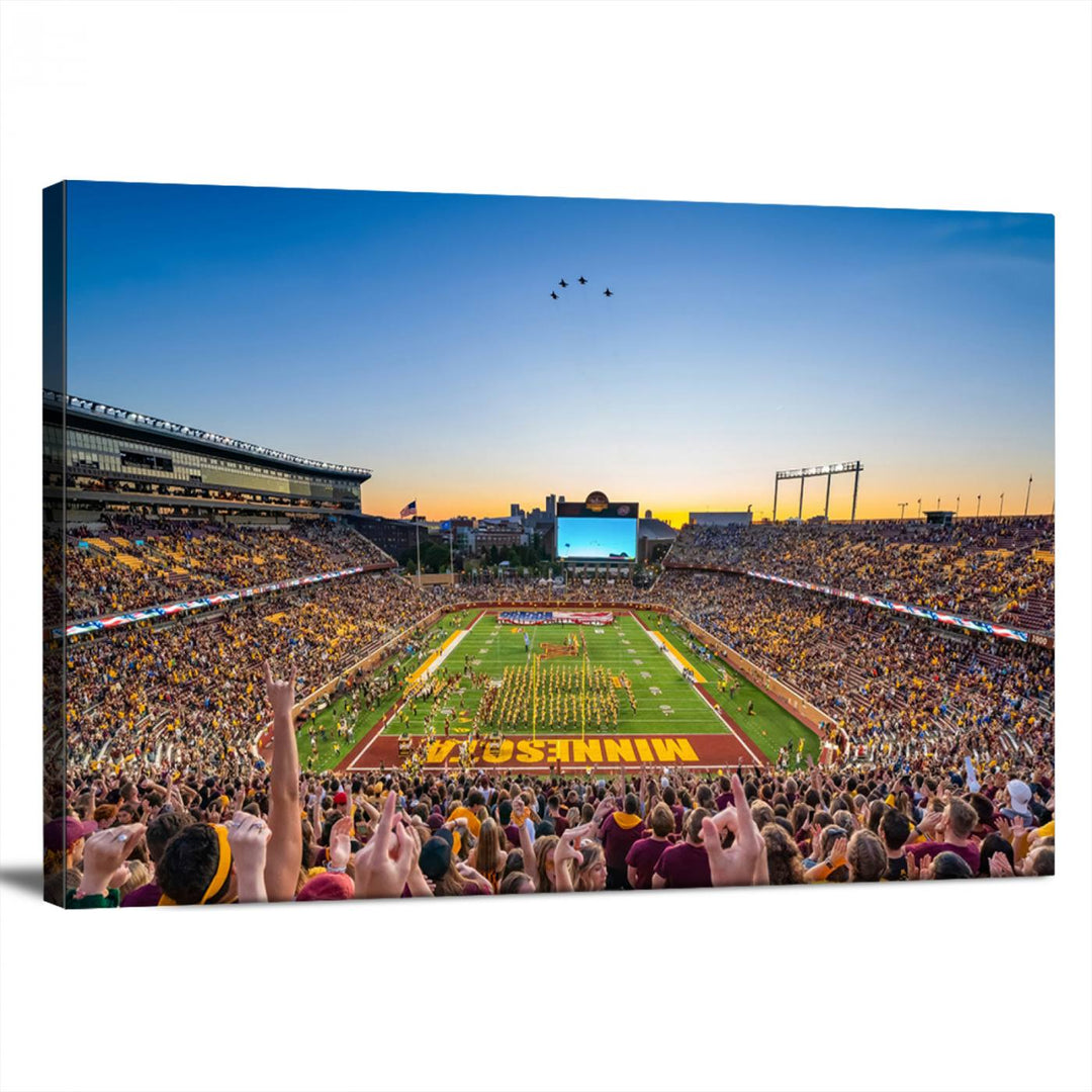 Canvas wall art featuring the University of Minnesota Football Team print, showcasing Huntington Bank Stadium at sunset with jets overhead.