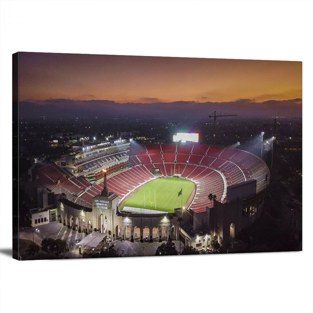 The USC Trojans Stadium canvas captures Memorial Coliseum at twilight, showcasing red seats and a green field beneath an orange sky.