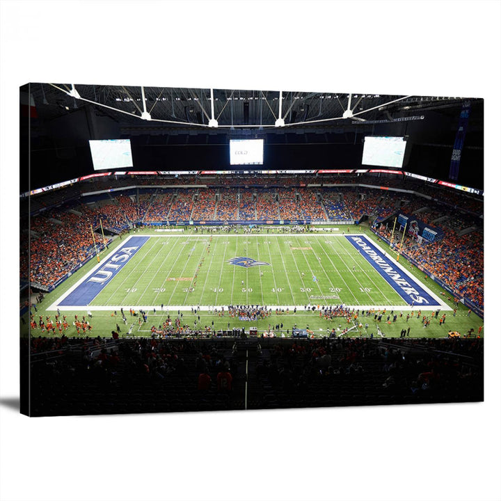 The UTSA Roadrunners game at Alamodome canvas print captures the scene from above, displaying fans and the UTSA lettering on the field.