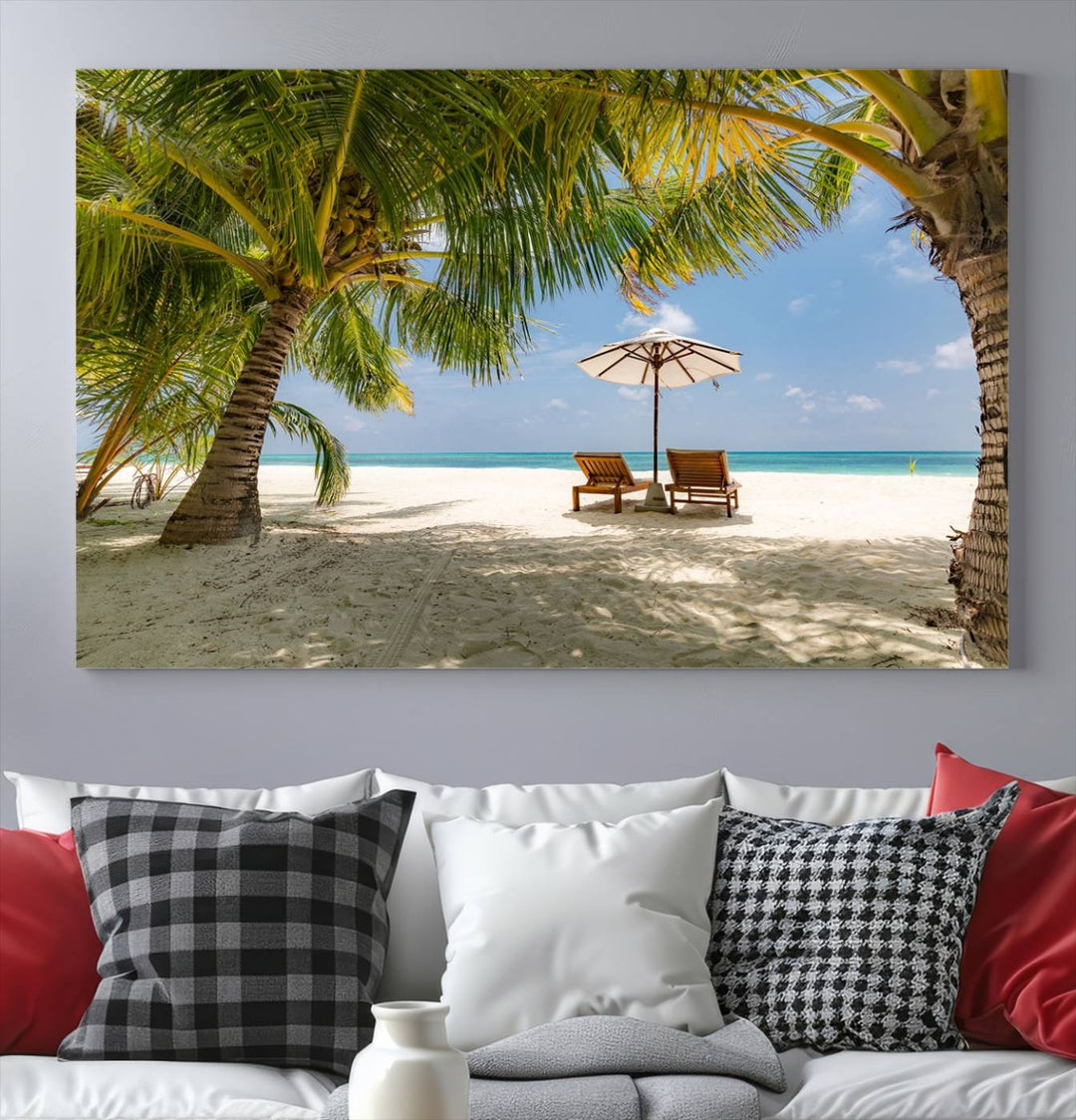 The canvas art print titled Lounge Chairs Palm Trees on Tropical Beach offers free shipping.