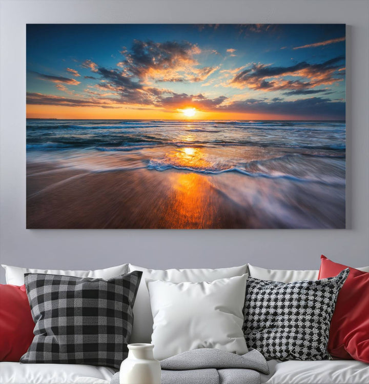 The Sunset on the Ocean canvas adds coastal ambiance to the wooden wall.