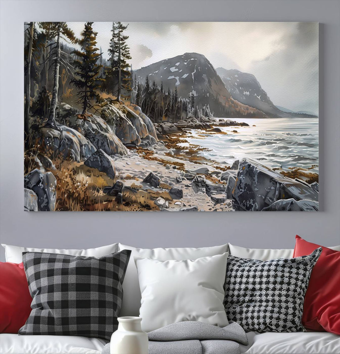 Framed wall art depicting Acadia National Parks rocky coast, trees, mountains, and sunlight over the sea; ready to hang.