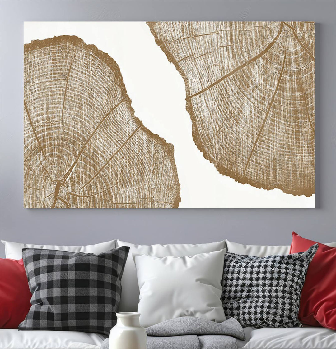 The rustic wall art features two large tree rings, beautifully framed and displayed to create a nature-inspired décor.