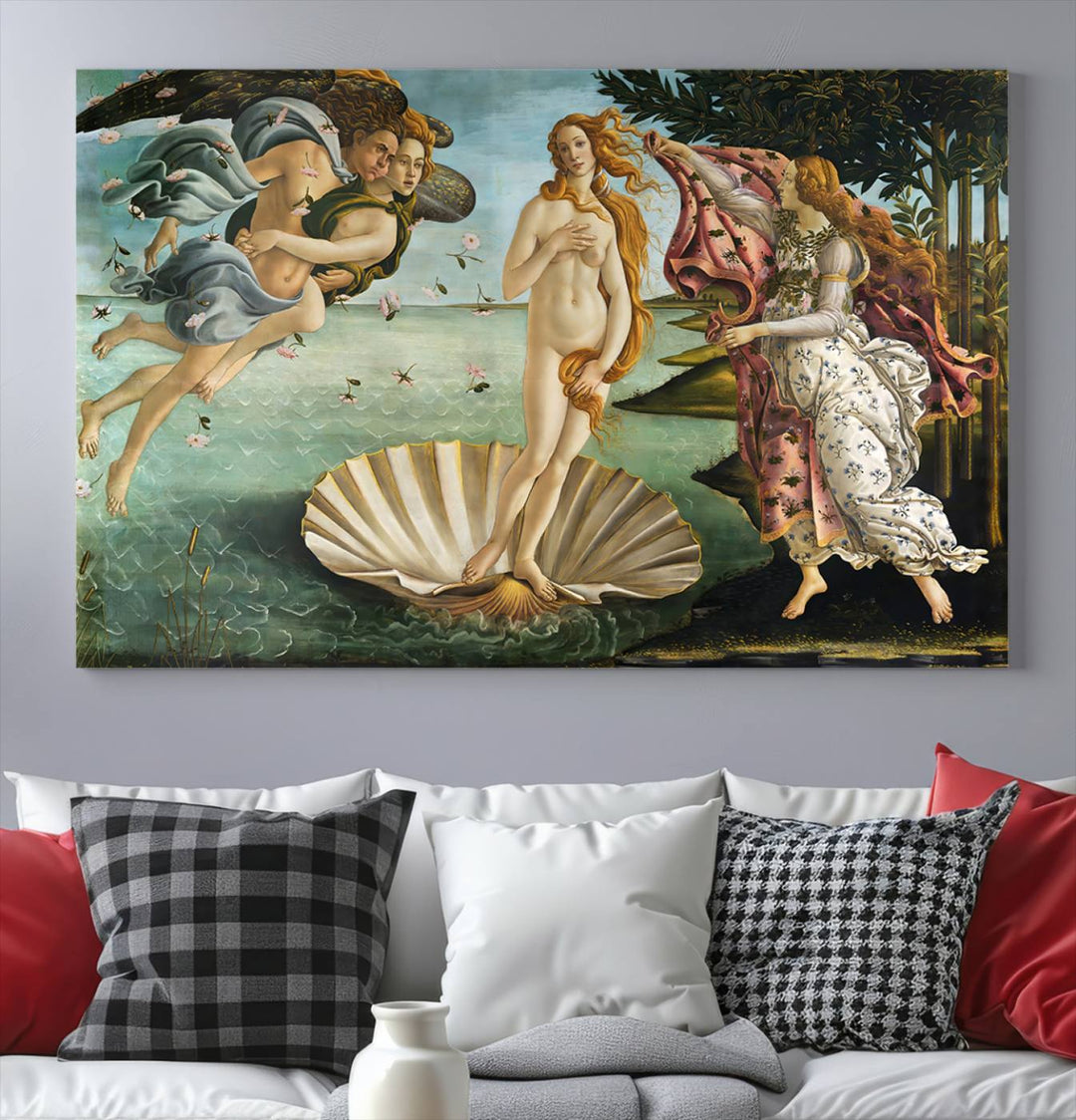 A canvas print of Botticellis The Birth of Venus is displayed on the wall.