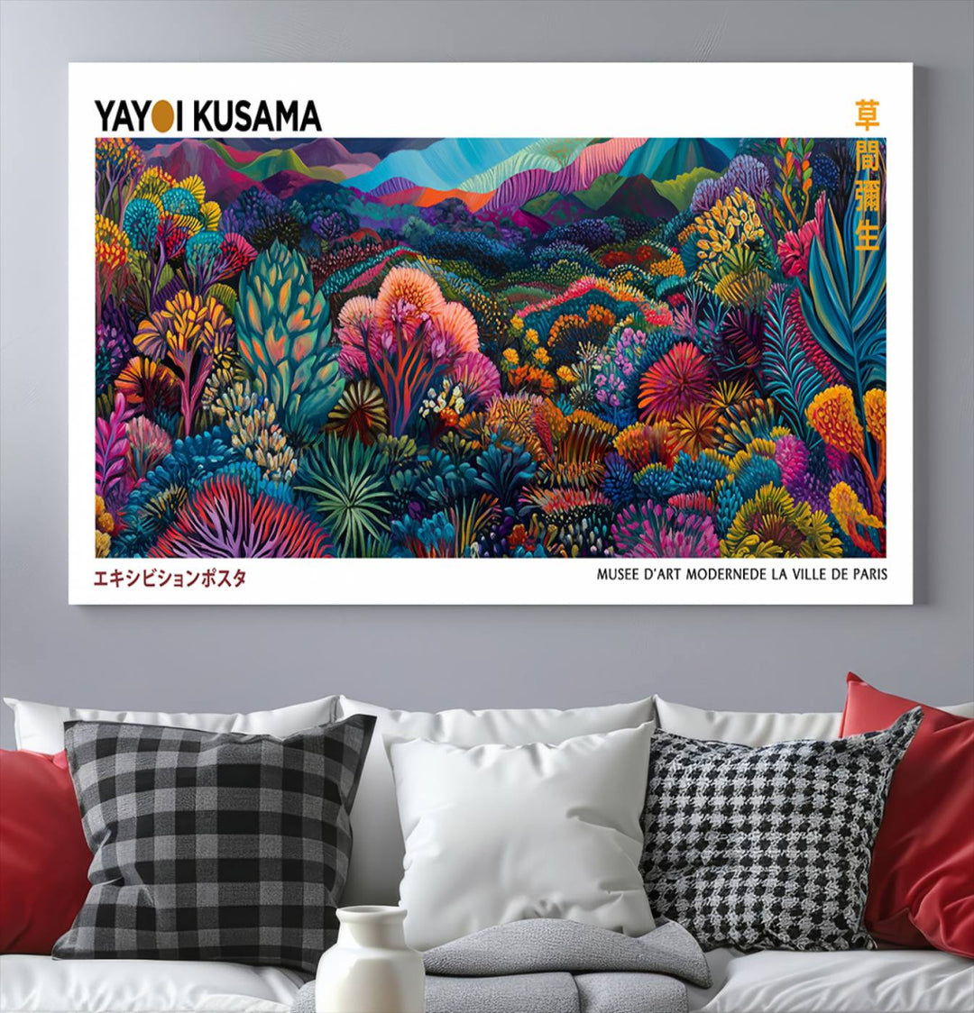 A framed Yayoi Kusama print hangs on the wall.