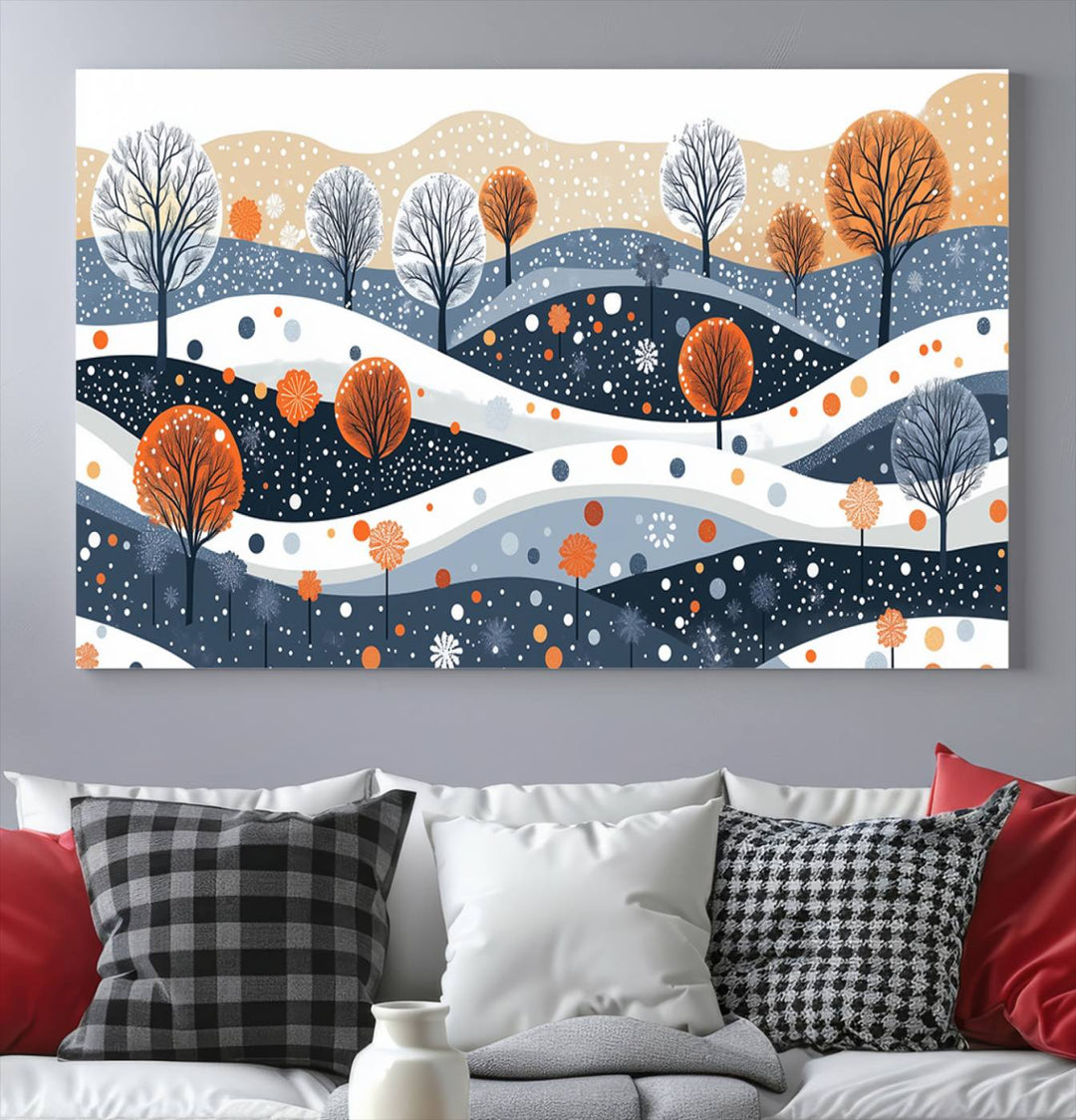 The "Abstract Winter Landscape Canvas Wall Art Print," featuring a triptych of landscapes with trees and hills in vibrant orange, white, and blue hues, adds a gallery-quality finish that transforms the space into an art lover's dream.