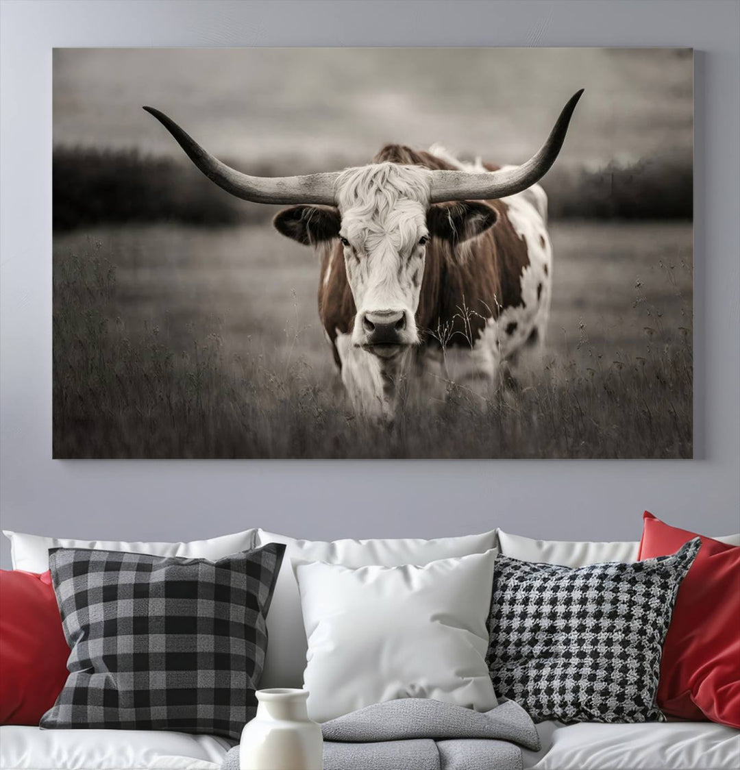 The Texas Longhorn Cow Canvas Wall Art Print adds a rustic touch to a living room.