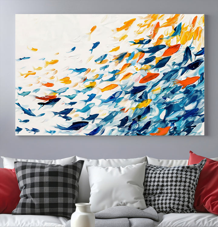 A colorful Abstract Fish Shoal Canvas Print hangs on the wall.