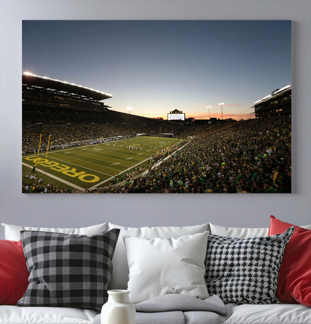 Canvas artwork depicting an Oregon Ducks football game at Autzen Stadium, capturing a sunset and packed stands.