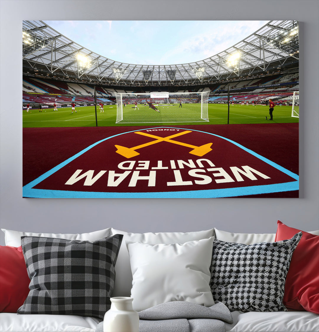 A soccer stadium with the West Ham United FC logo.