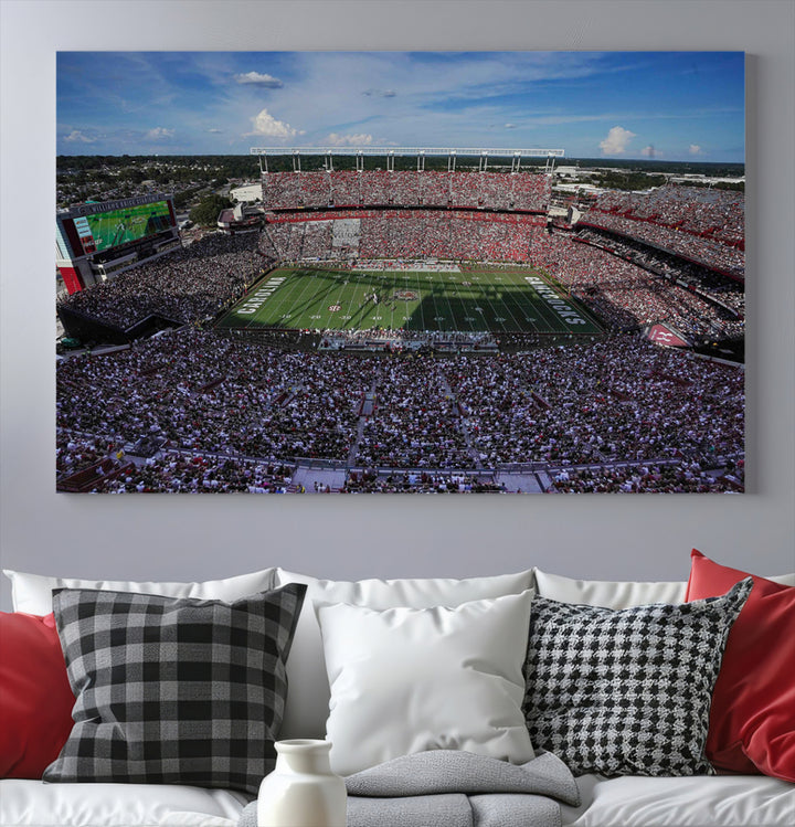 The wall art is a South Carolina Gamecocks print, showcasing Williams-Brice Stadium from a distance under clear skies.