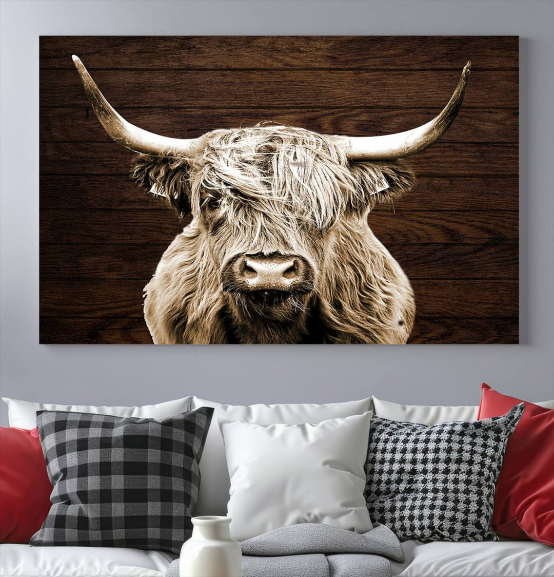 Highland Cow Wall Art Canvas Print: Majestic Scottish bull on rustic decor, ready to hang.