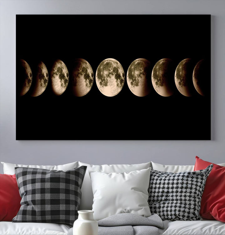 The "Phases of the Moon Wall Art" canvas print elegantly hangs on the wall.