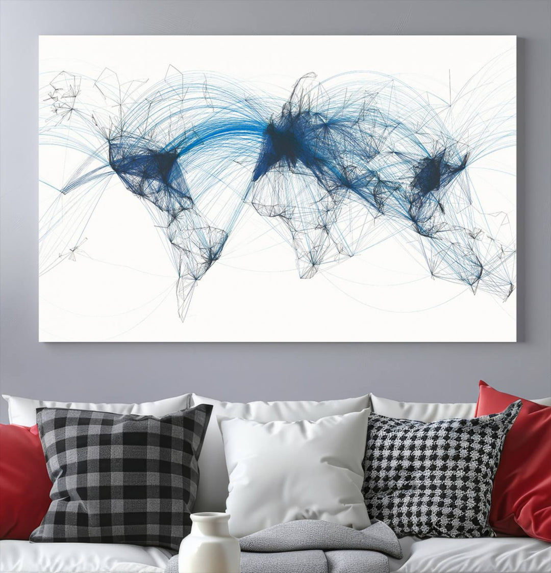 The Aviation Flight Map Wall Art is a set of three abstract panels featuring a world map with blue lines, resembling a flight map. Ideal for aviation enthusiasts, this ready-to-hang framed air traffic art print enhances the appeal of modern decor.