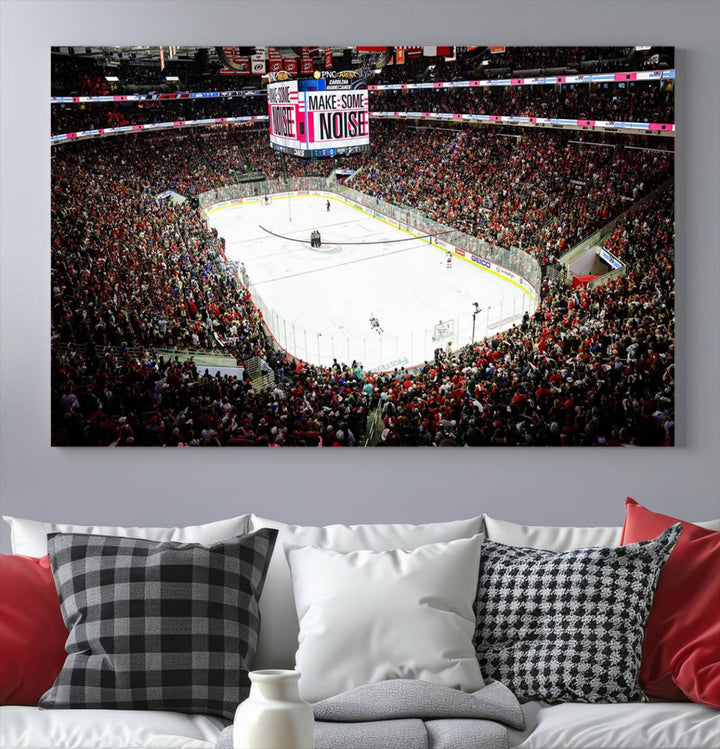 The living room features the PNC Arena Raleigh North Carolina Hurricanes Hockey Stadium Wall Art Canvas Print, which depicts a crowded ice hockey stadium with enthusiastic fans and an ongoing game, all rendered in high-resolution on museum-quality canvas.