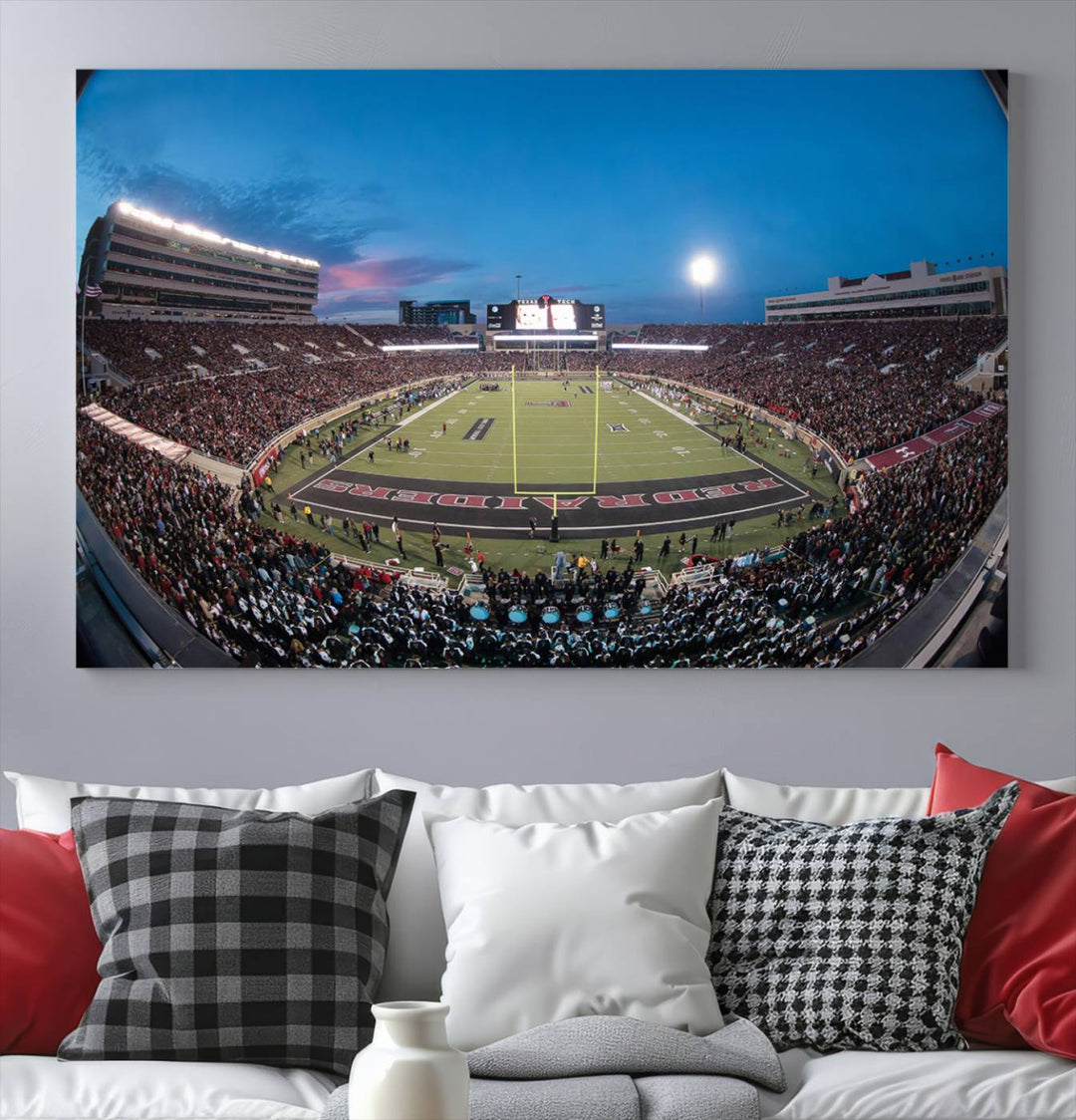 The wall art in the living room features a Texas Tech Red Raiders Football Team Print, showcasing Jones AT&T Stadium at dusk.