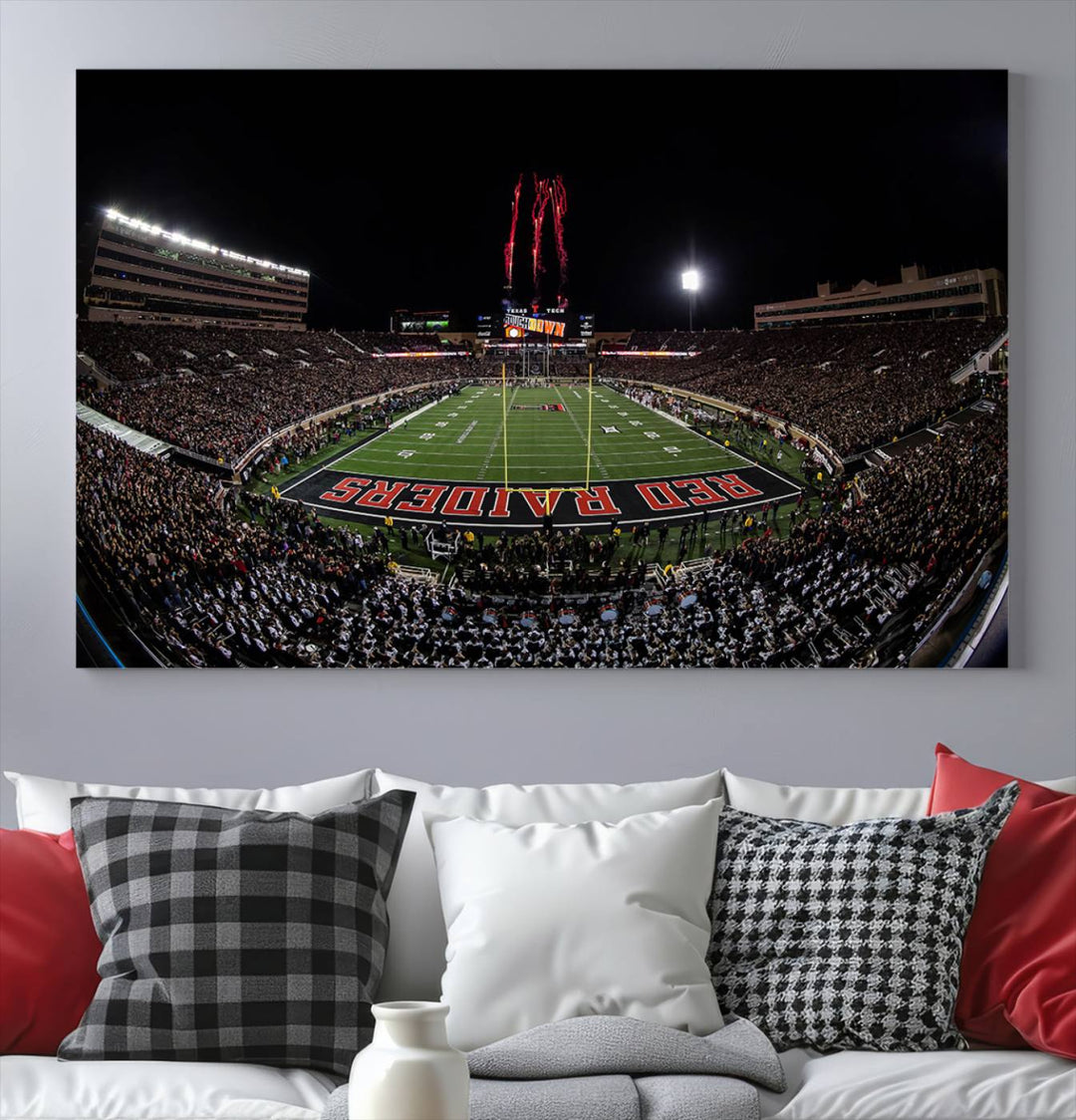 The wall features a Texas Tech Red Raiders Football Team Print on canvas, showcasing fireworks over a packed stadium at night.