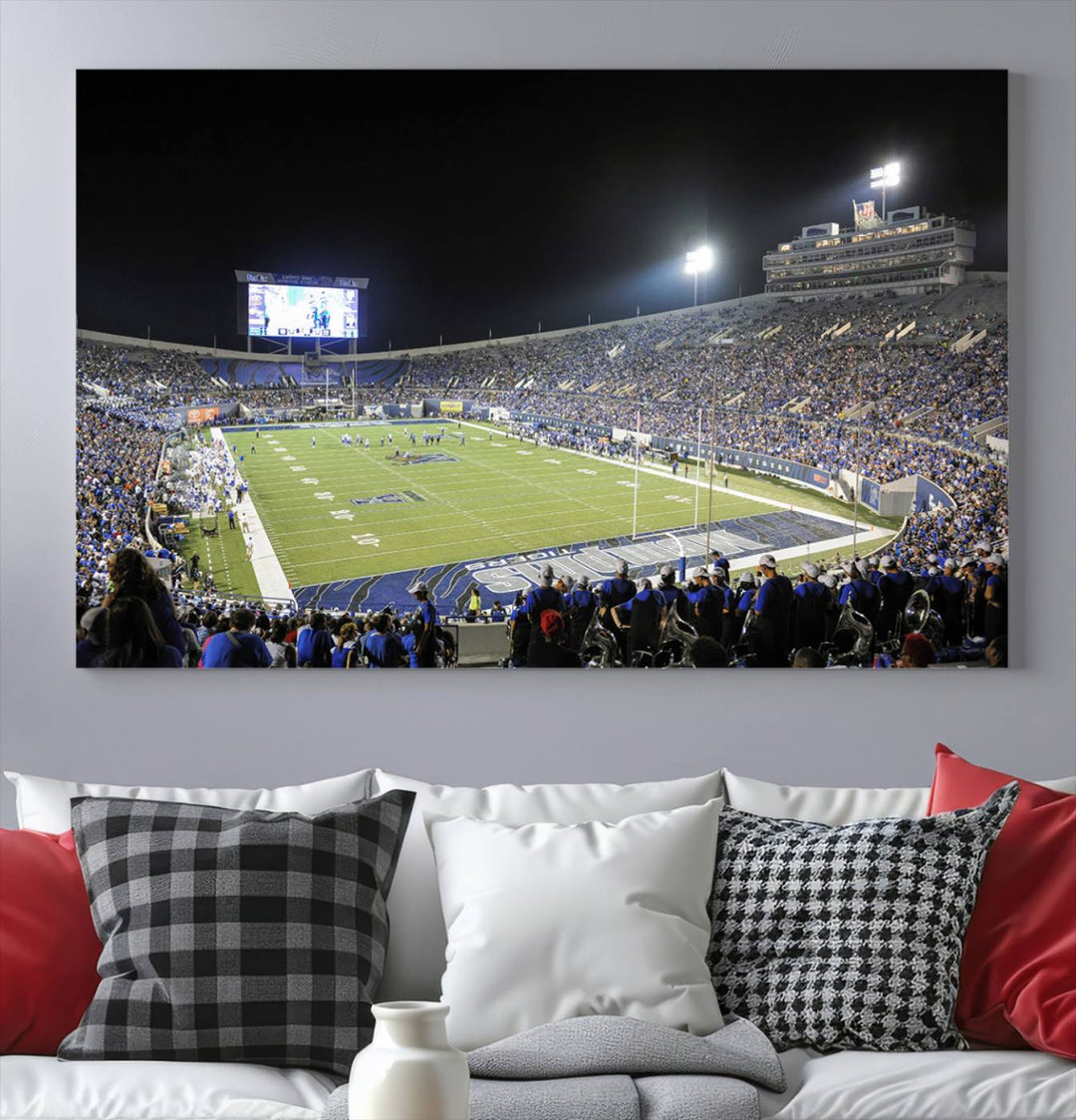 A vibrant depiction of Liberty Stadium at night, highlighting a Tigers football game on the large screen with stands filled with enthusiastic fans.